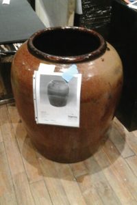 Pottery vase being cataloged by the artwork shipping and delivery team.
